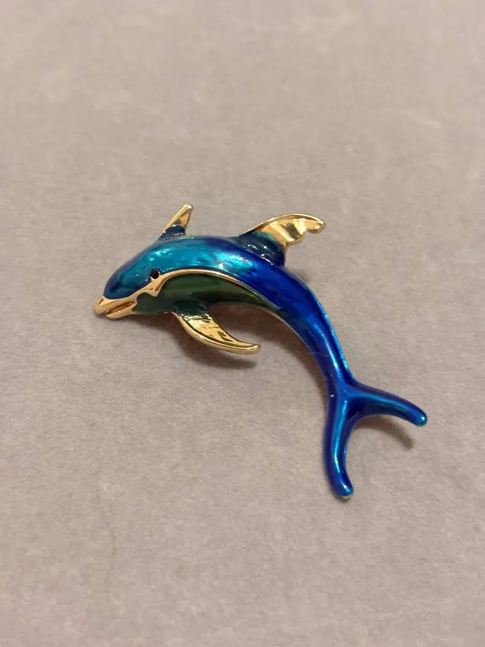 Golden Dolphin Brooch — Brooches