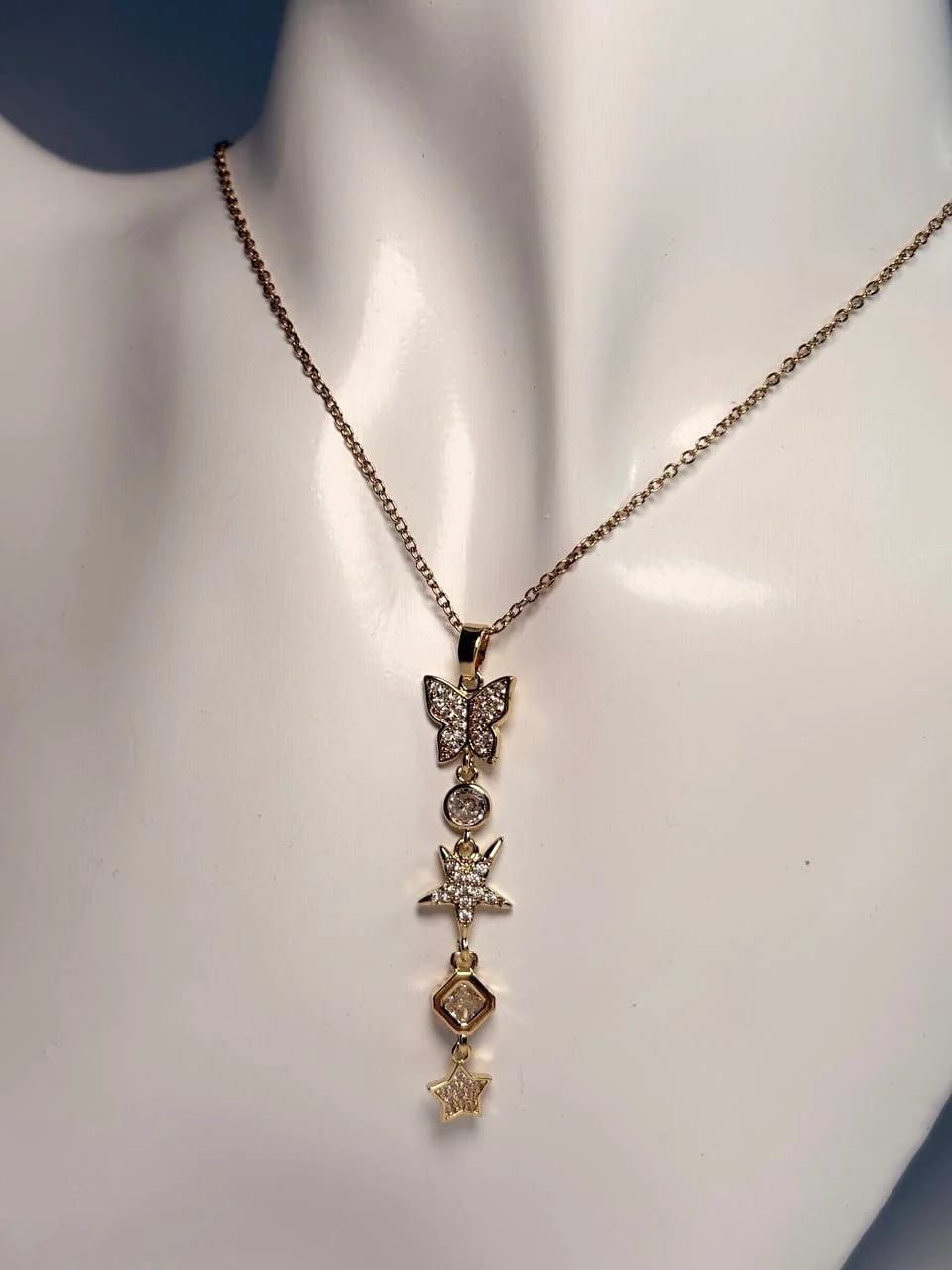 Butterfly star drop necklace